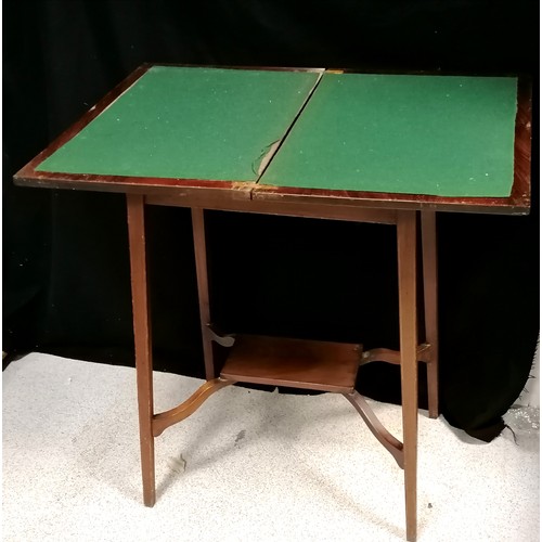 645 - c.1920's mahogany small foldover card table with stringing to the top & legs