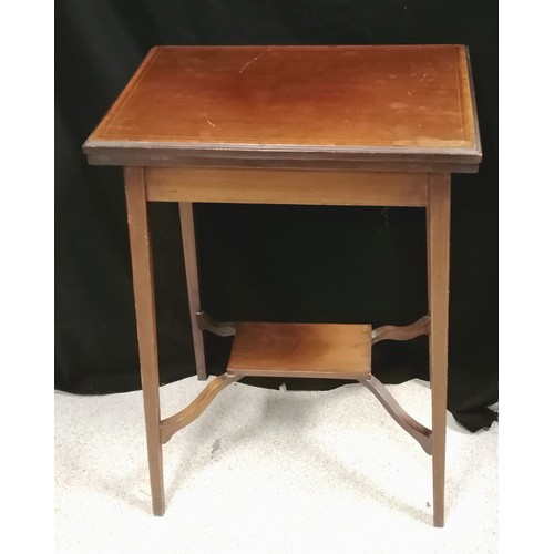 645 - c.1920's mahogany small foldover card table with stringing to the top & legs