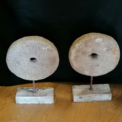 648 - pair of concrete circular millstones mounted on wooden bases - 20