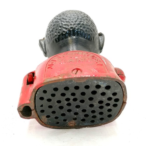 Antique 'Jolly nigger bank' money box