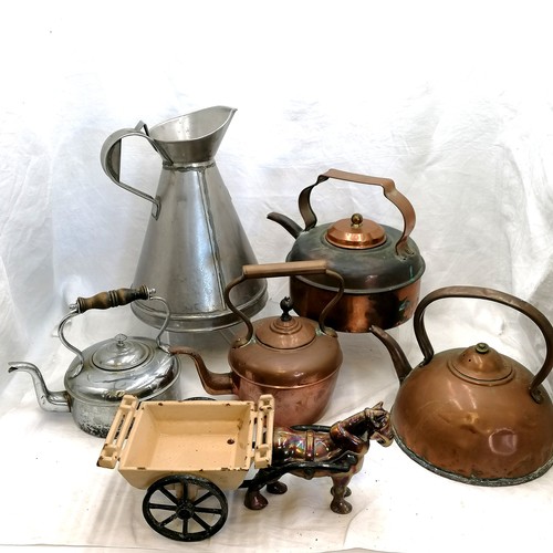 110 - 4 kettles, large jug & Ofco enamelled horse / cart