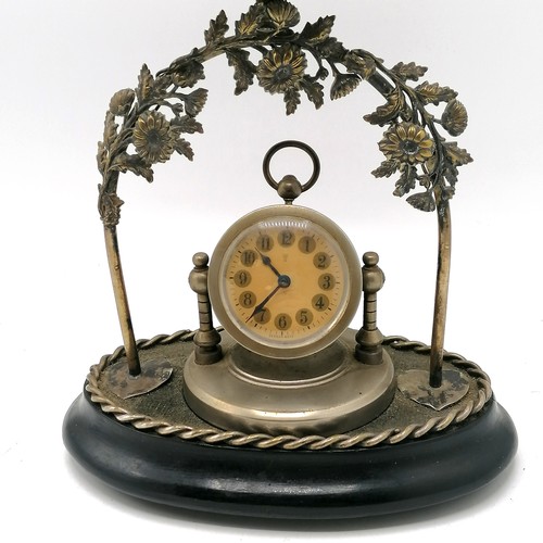 7 - Novelty emu egg mounted on a decorative nickel plated & wooden base stand sporting a clock to the ce... 