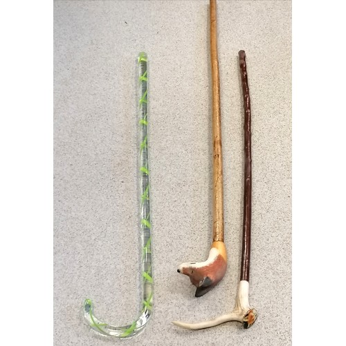 9 - 3 walking sticks - 1 with large hand carved fox head handle, 1 with antler handle with fox painted o... 