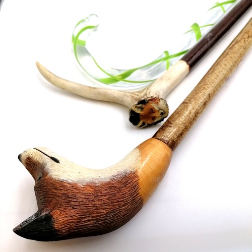 9 - 3 walking sticks - 1 with large hand carved fox head handle, 1 with antler handle with fox painted o... 