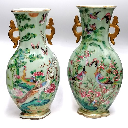 40 - Pair 19thC Chinese Canton vases decorated with butterflies & birds 1 a/f (damage to 1 handle and cra... 