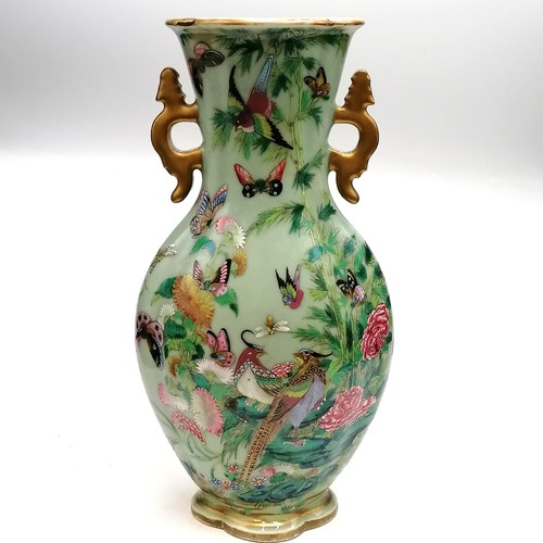 40 - Pair 19thC Chinese Canton vases decorated with butterflies & birds 1 a/f (damage to 1 handle and cra... 