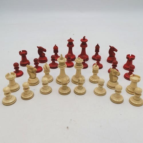 115 - 2 chess sets (inc an antique bone painted set) + a chessboard - both sets complete