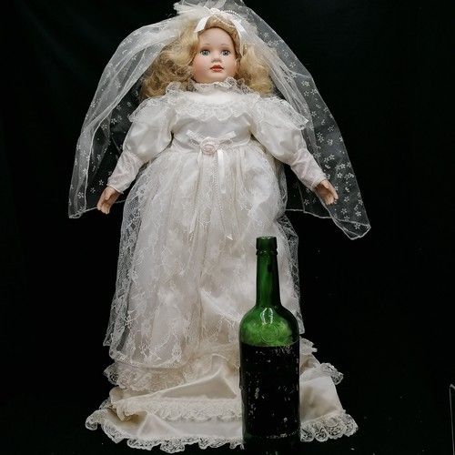 179 - Large china head doll in wedding dress - 27