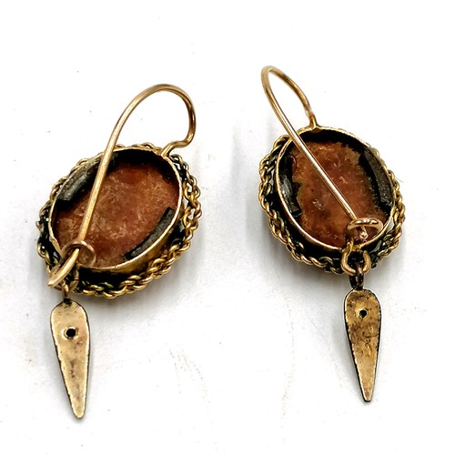 224 - Pair of antique unmarked gold earrings set with amber total drop 3cm