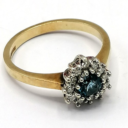 283 - 9ct gold diamond & heart shaped topaz set ring - total weight 2.5g