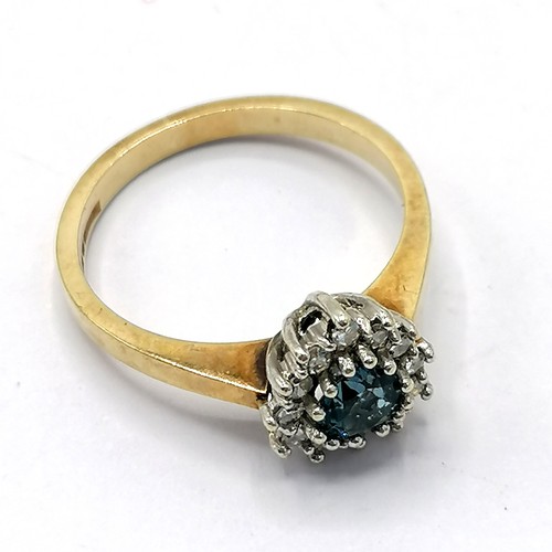 283 - 9ct gold diamond & heart shaped topaz set ring - total weight 2.5g