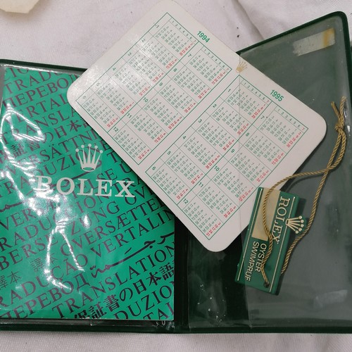 357 - 15 rolex certificates, Rolex wallet service pouch, 2 booklets, 6 swing tags, anchor swing tag plus 3... 