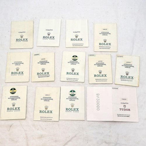 357 - 15 rolex certificates, Rolex wallet service pouch, 2 booklets, 6 swing tags, anchor swing tag plus 3... 