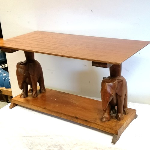 600 - Hardwood coffee table with carved elephant supports - 33