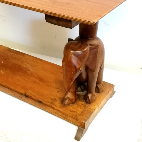 600 - Hardwood coffee table with carved elephant supports - 33