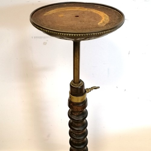 605 - Antique adjustable brass & wooden stand with plainshed decoration under top - maximum height 43