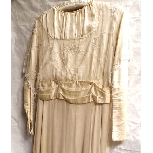 650 - Edwardian cream silk dress with overlaid beaded netting - some staining around neckline & small hole... 