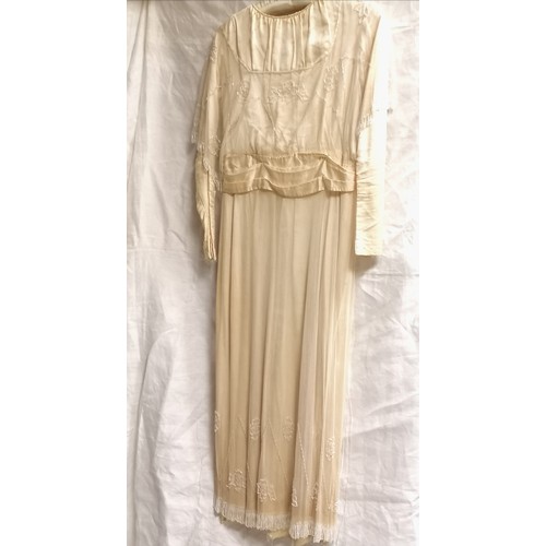 650 - Edwardian cream silk dress with overlaid beaded netting - some staining around neckline & small hole... 