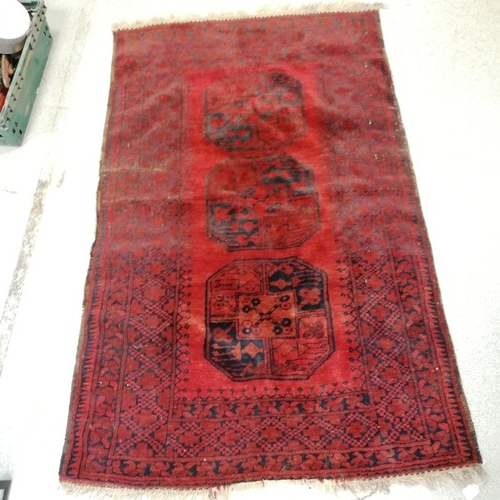 703 - Wool black & red rug - 72