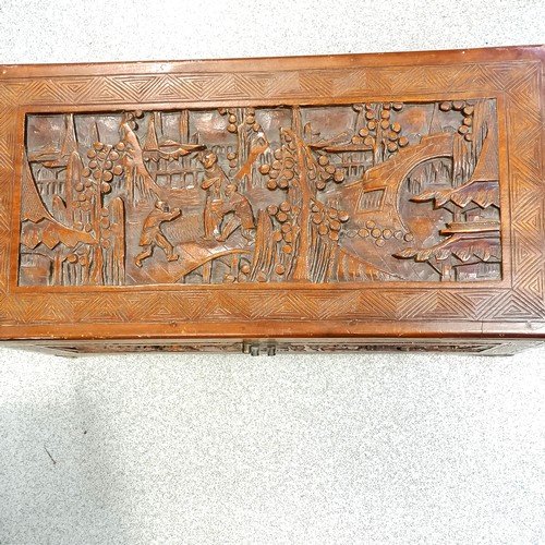 712 - Chinese carved camphor wood chest 29