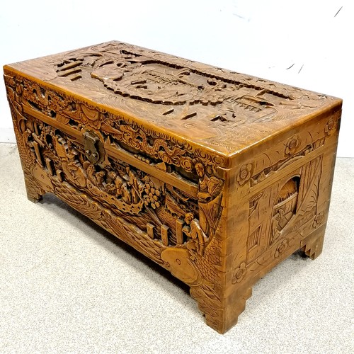 713 - Oriental carved camphor wood chest. In good condition. 29