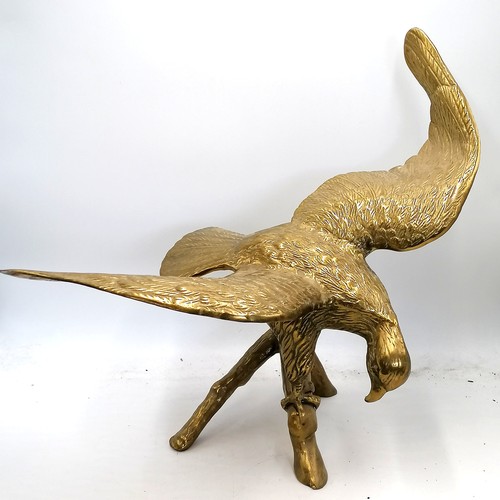 714 - Large brass eagle figure on a branch - wingspan 22