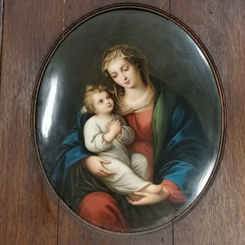 736 - Large oval Berlin KPM plaque depicting Madonna and Child, 16¾