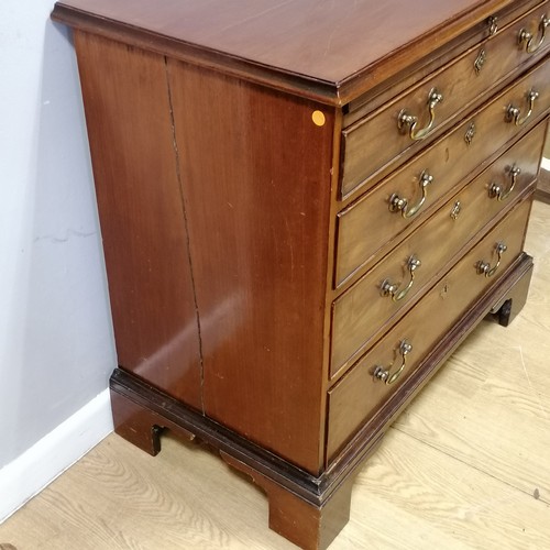 600A - Antique mahogany chest of drawers with brush slide. Crack to top and both sides