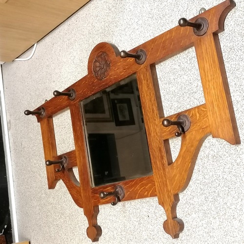 599 - Good quality oak coat rack with tudor rose decoration - solid metal hooks & bevelled mirror plate - ... 