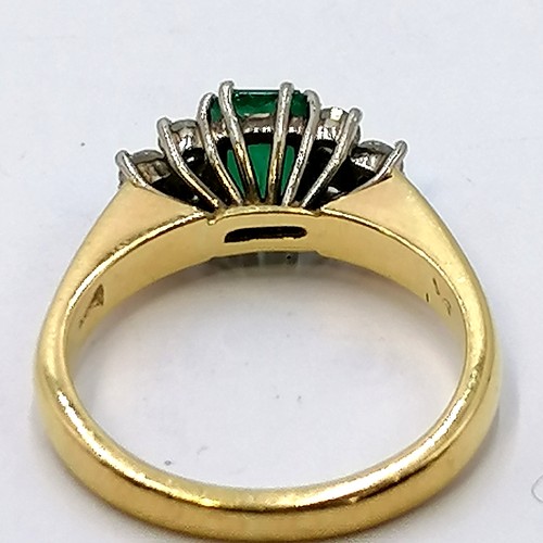 241 - 18ct emerald & diamond set ring