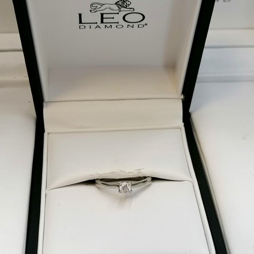 357 - Platinum solitaire diamond (0.18ct) ring in original Leo box - inside the shank the 'O' of 'Leo' is ... 