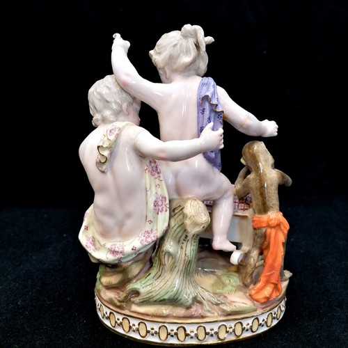 422 - 1878 Meissen group- Children playing with a goat kid in a cot and a drummer monkey H.89 after Johann... 