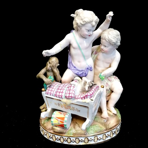 422 - 1878 Meissen group- Children playing with a goat kid in a cot and a drummer monkey H.89 after Johann... 