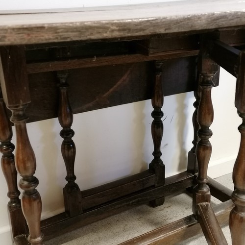 609 - Antique 18th century folk gateleg / drop flap table with turned baluster legs / supports with a cand... 