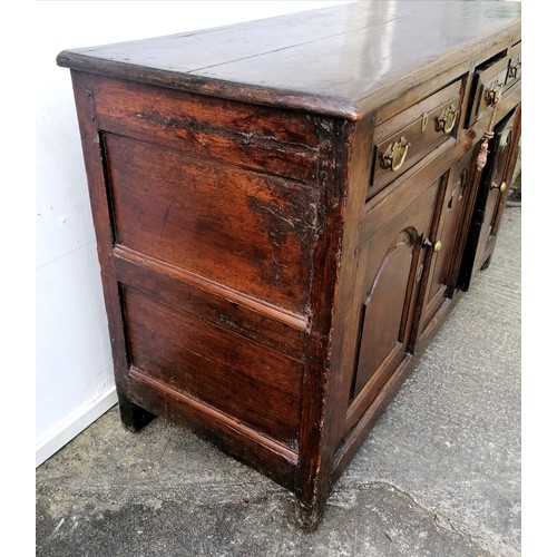 617 - 18th century oak low dresser comprising of 3 drawers over 2 cupboards with central panel - arched pa... 