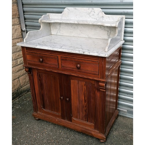 620 - Antique pitch pine washstand with white marble top & 2 drawer and 2 door cupboard to base - 31