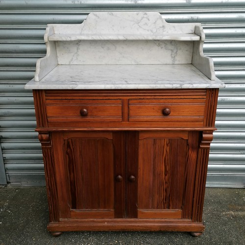 620 - Antique pitch pine washstand with white marble top & 2 drawer and 2 door cupboard to base - 31