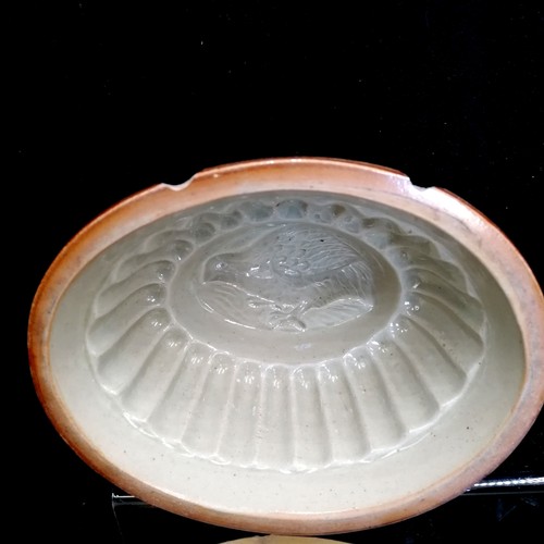 12 - 7 antique stoneware jelly moulds, 3 a/f incl 2 with bird motifs