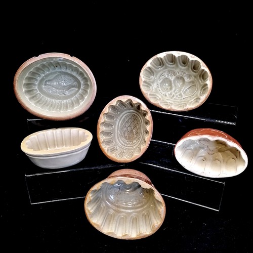 12 - 7 antique stoneware jelly moulds, 3 a/f incl 2 with bird motifs