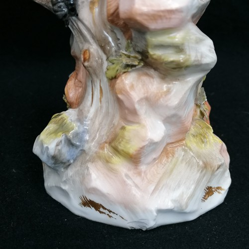 143 - Meissen parrot - height 21cm ~ restoration to one wing and  claw, chip to base / flowers