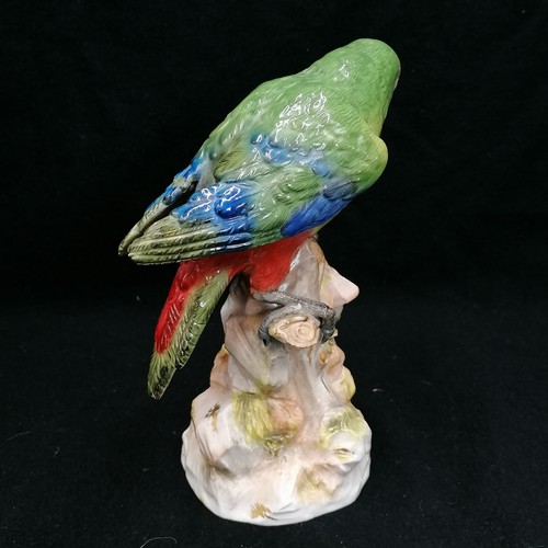 143 - Meissen parrot - height 21cm ~ restoration to one wing and  claw, chip to base / flowers