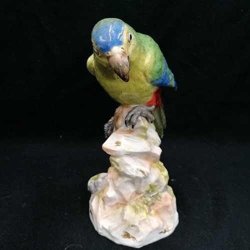 143 - Meissen parrot - height 21cm ~ restoration to one wing and  claw, chip to base / flowers