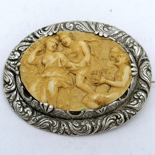 253 - Antique hand carved ivory unmarked silver brooch (6cm high & wear to some claws) t/w Peruvian silver... 