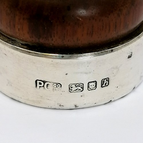 402 - Treen pepper mill with silver mounts. London 1963. ht 14cm