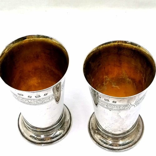 408 - 1972 silver pair of beakers with gilded interiors by Deakin & Francis Ltd - 12.7cm high & 495g. In g... 