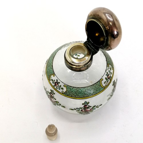 434 - Silver topped scent bottle with enamel decoration to body (dents to lid) - 10cm high