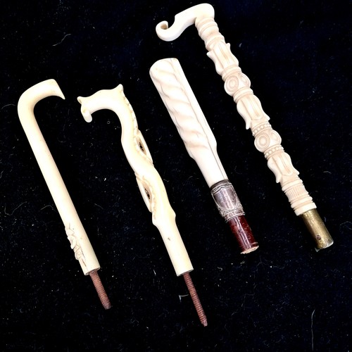 478 - 4 antique ivory parasol handles