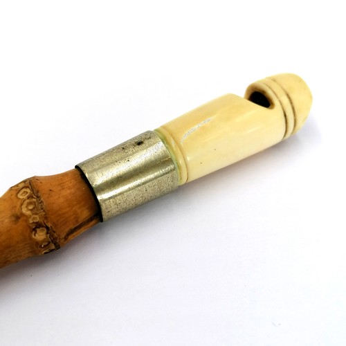 482 - Antique carved ivory dog whistle/dog whip with bamboo shaft and bone whistle. 72cm total length. han... 