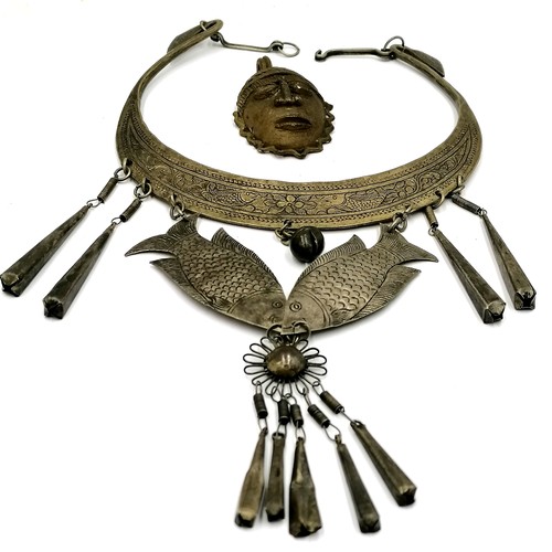 502 - North African white metal necklet, African Baule mask pendant, old Dyak kris handle and a Phillipino... 