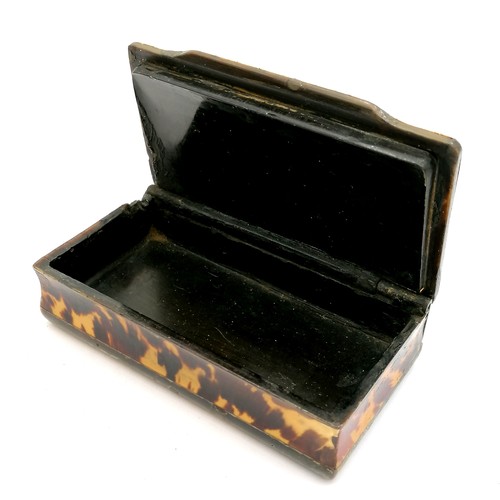 519 - Antique continental large tortoiseshell table snuff box with moulded scene to top depicting a courti... 